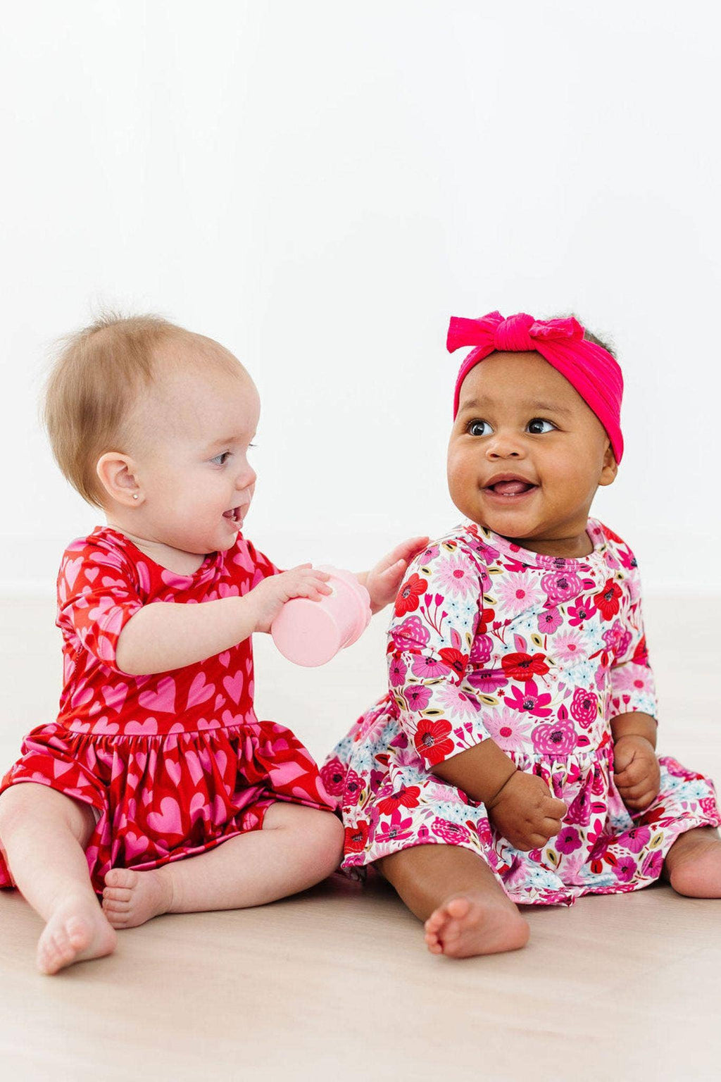 Mila & Rose 3/4 Sleeve Twirl Bodysuit - Hearts & Hugs
